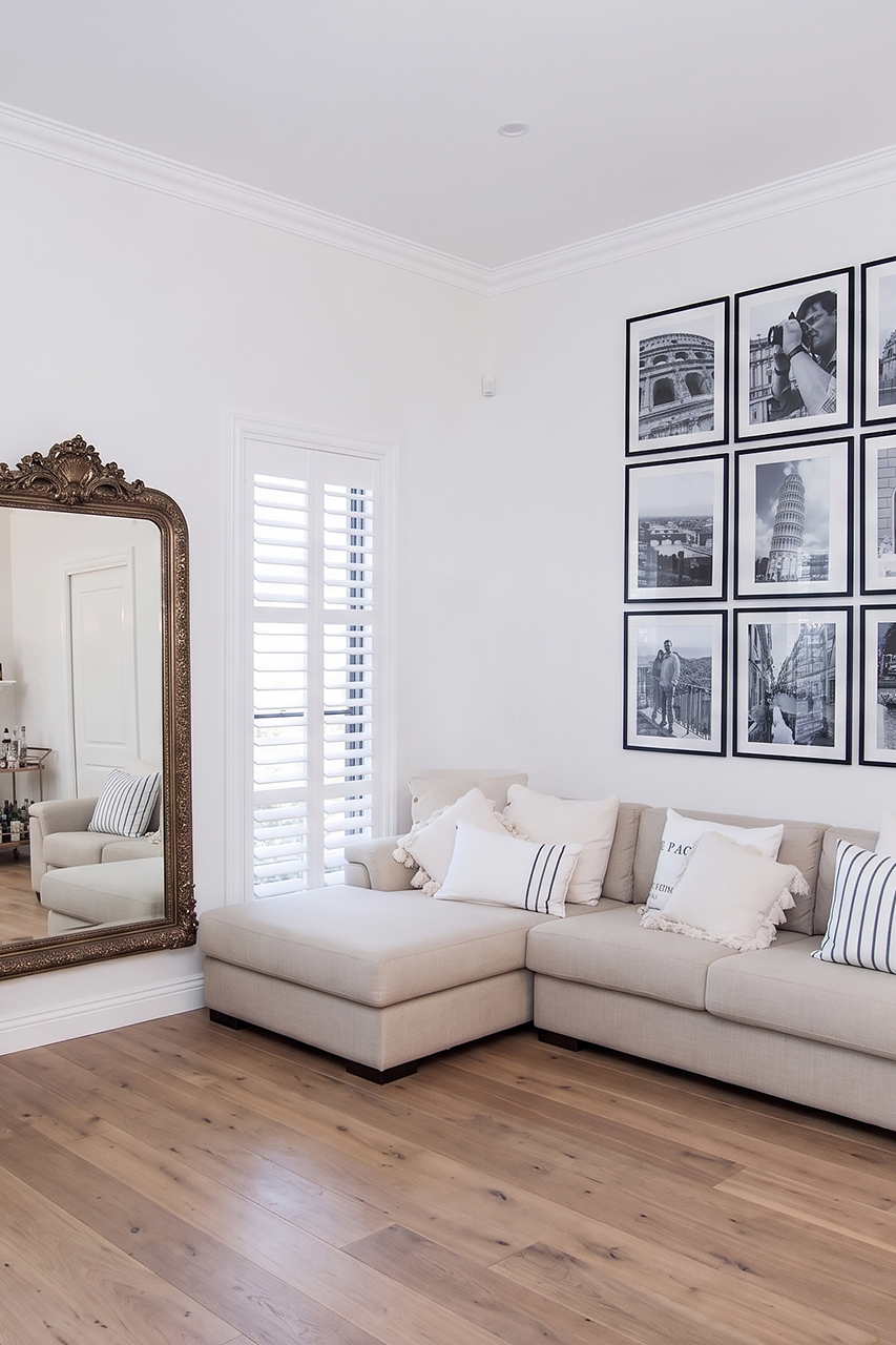 White Plantation Shutter In Corner Of Loungeroom