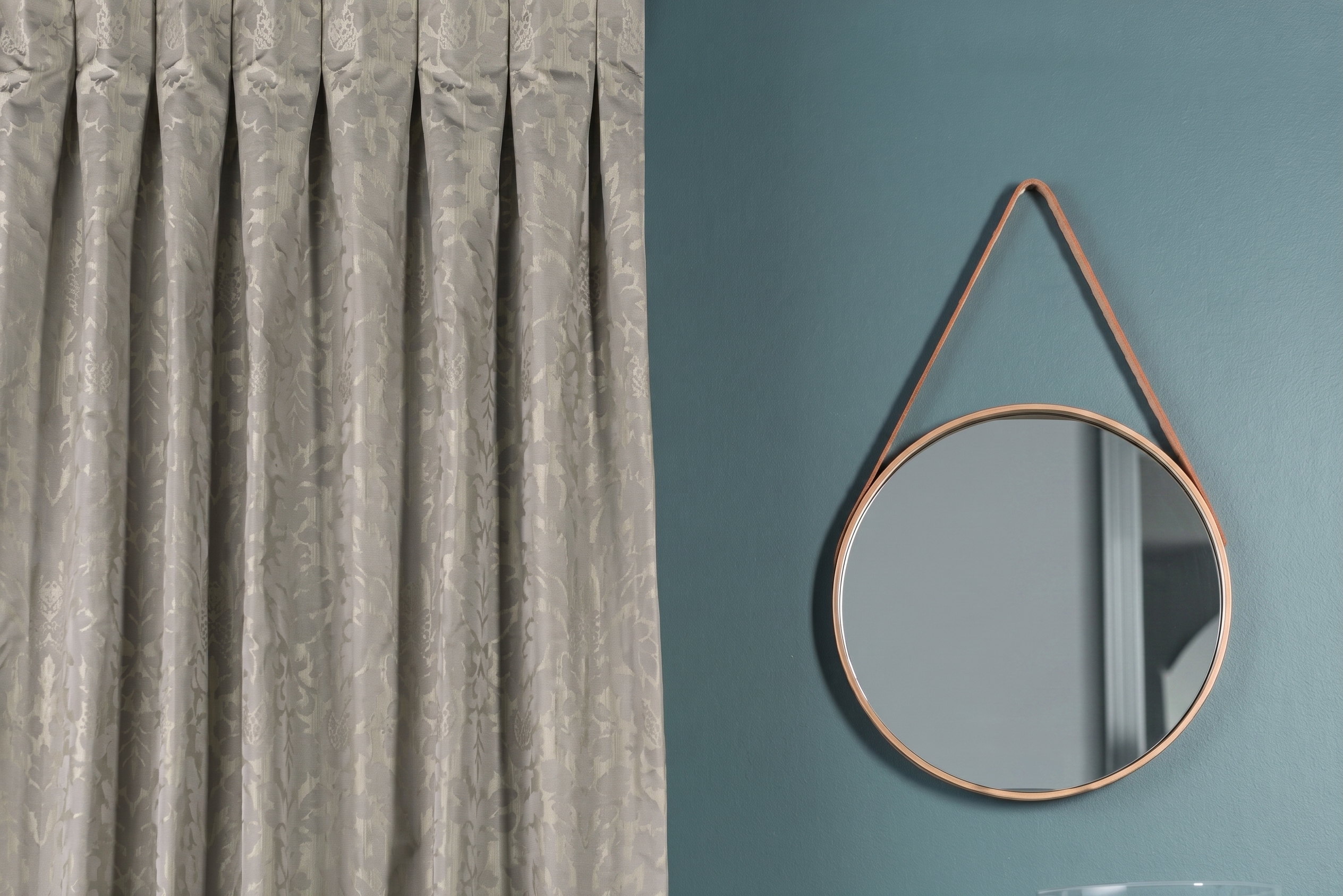 Heavy Drapes next to a mirror