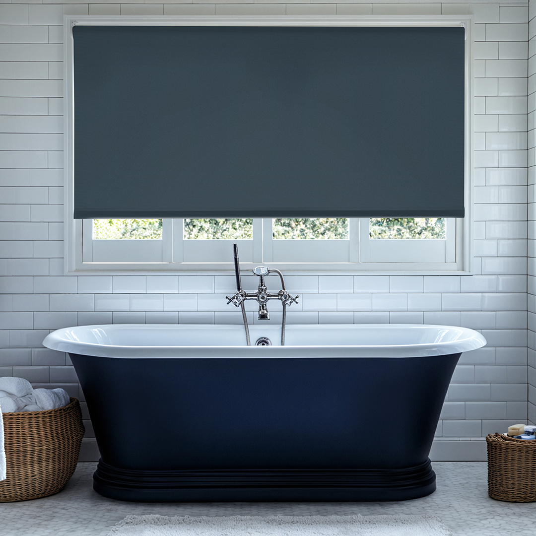 Navy roller blinds in the bathroom