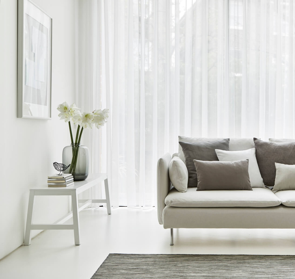 White-sheer-curtains-in-a-white-living-room