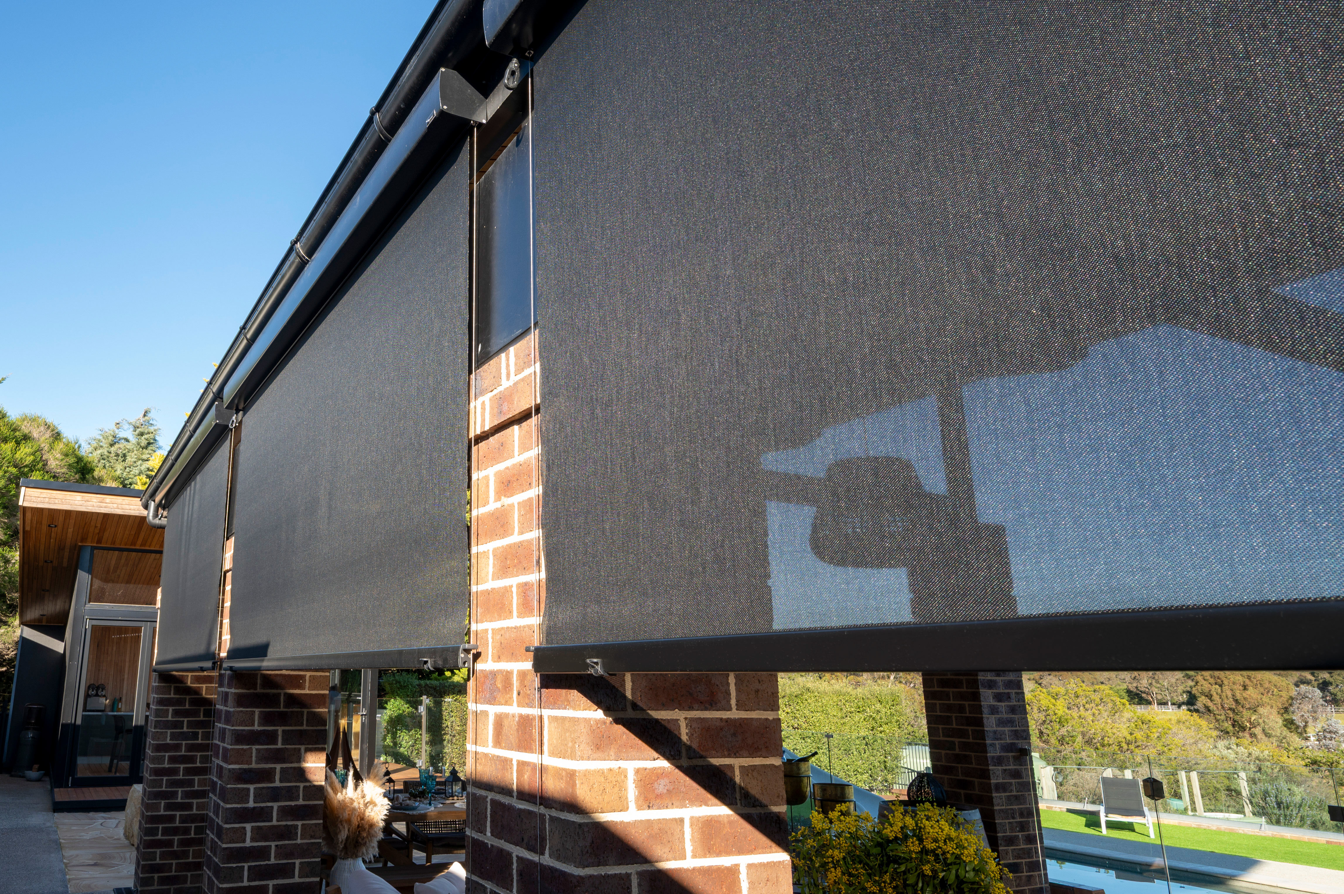 Close up shot of outdoor blinds in alfresco area