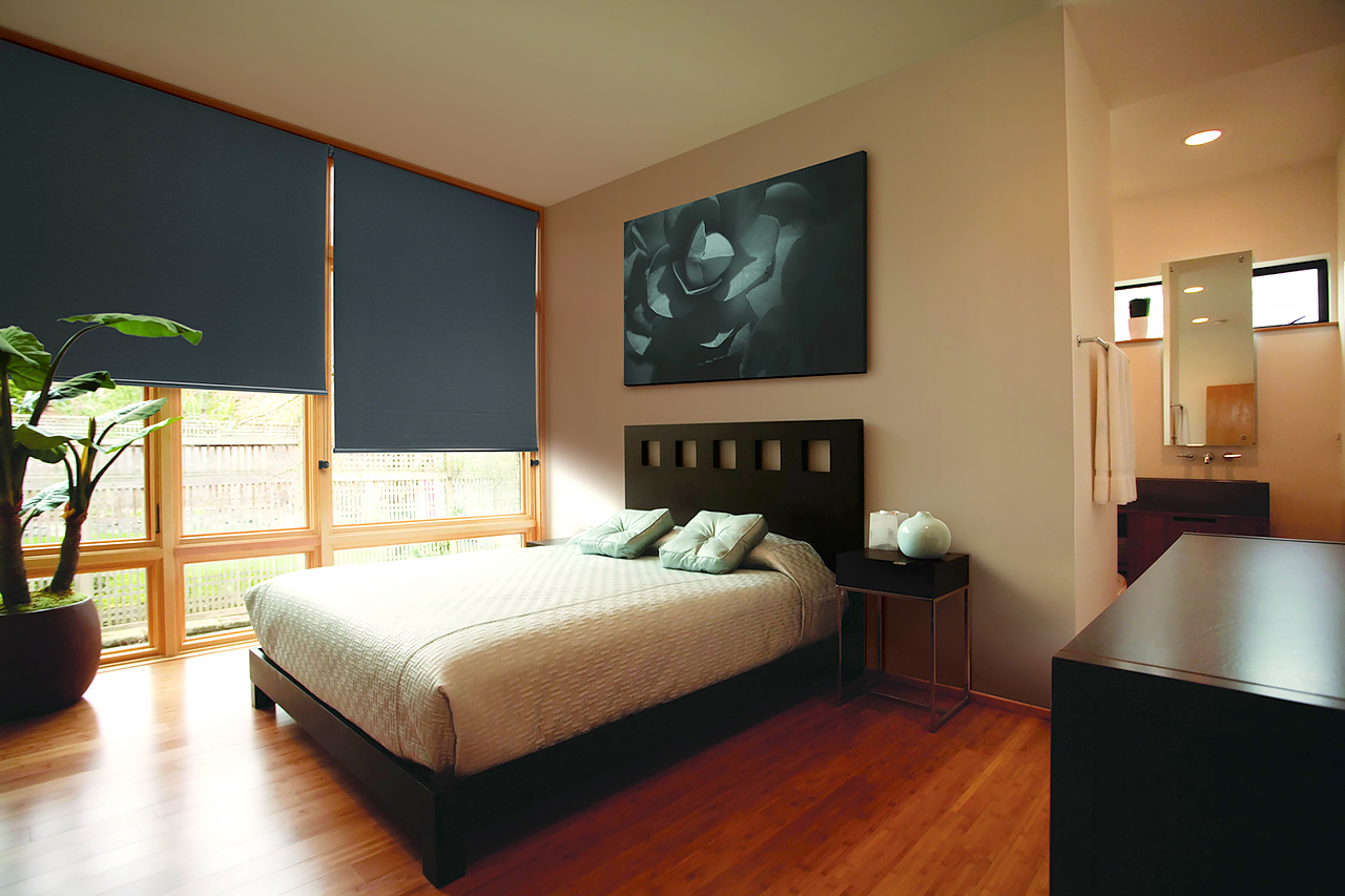 Roller Blinds In Darkened Bedroom