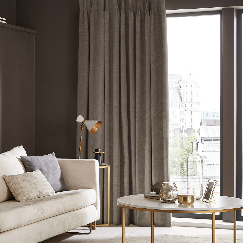 Stylish-pencil-pleat-curtain-featuring-a-delicate-floral-pattern-perfect-for-a-cozy-ambiance