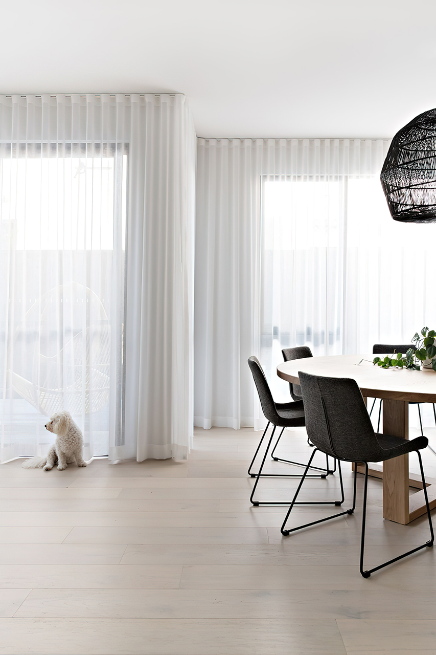 Sheer curtains in the family area of a modern home